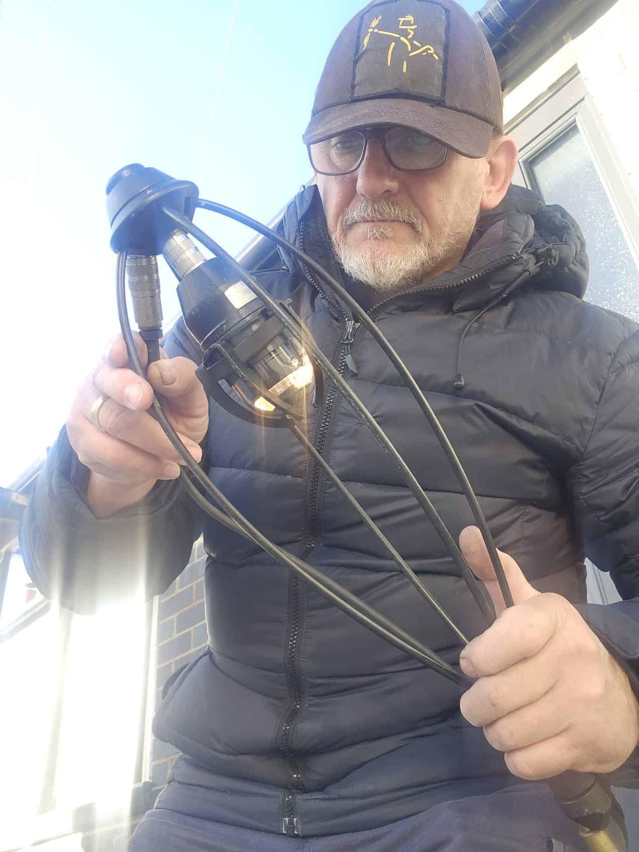 Inspection of chimney and gas safety equipment by professional technician.