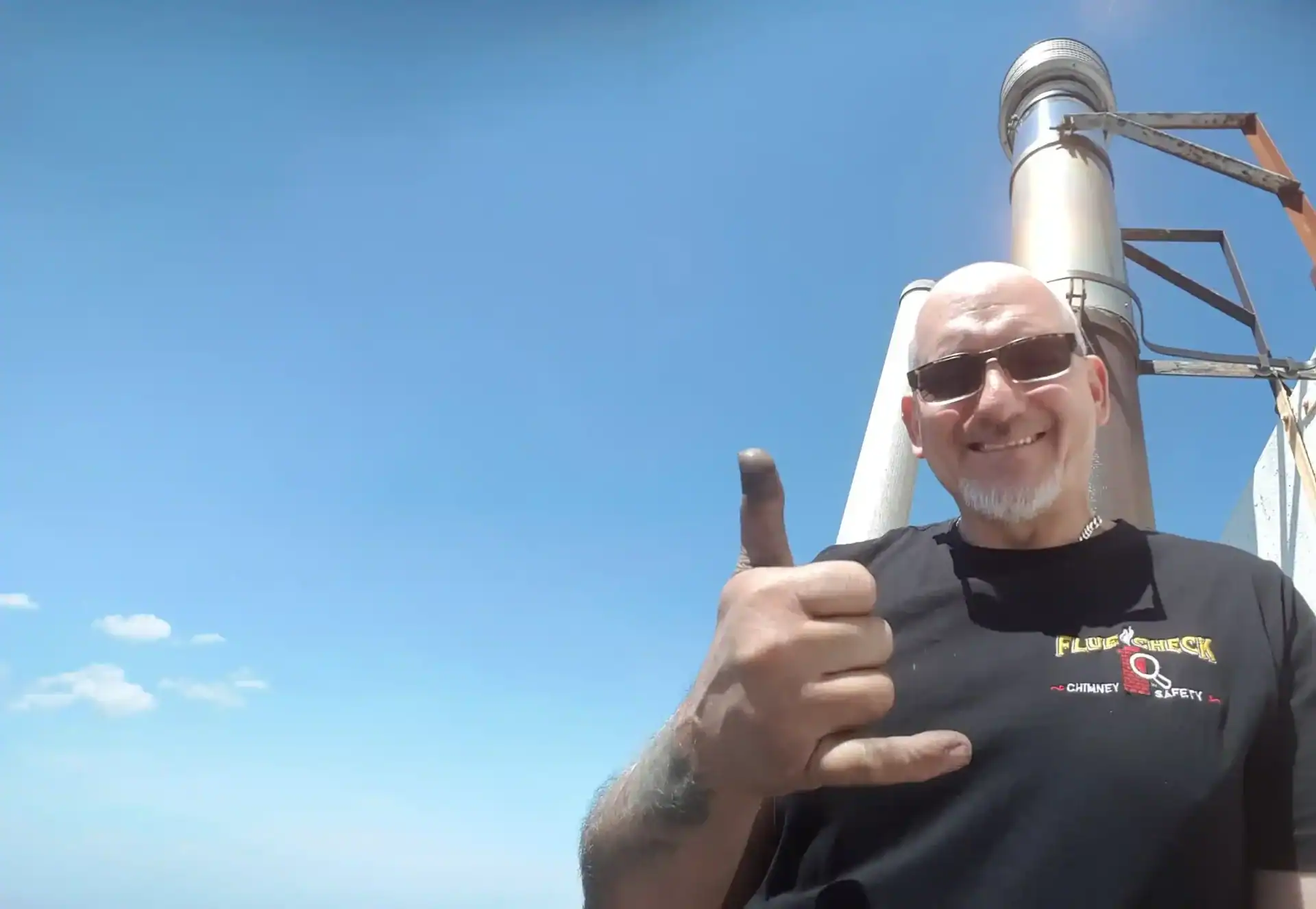 Biomass Boiler Flue being serviced in Wirral by Tony Preston of Flue Check