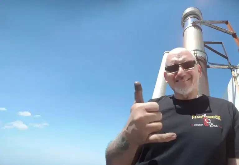 Biomass Boiler Flue being serviced in Wirral by Tony Preston of Flue Check