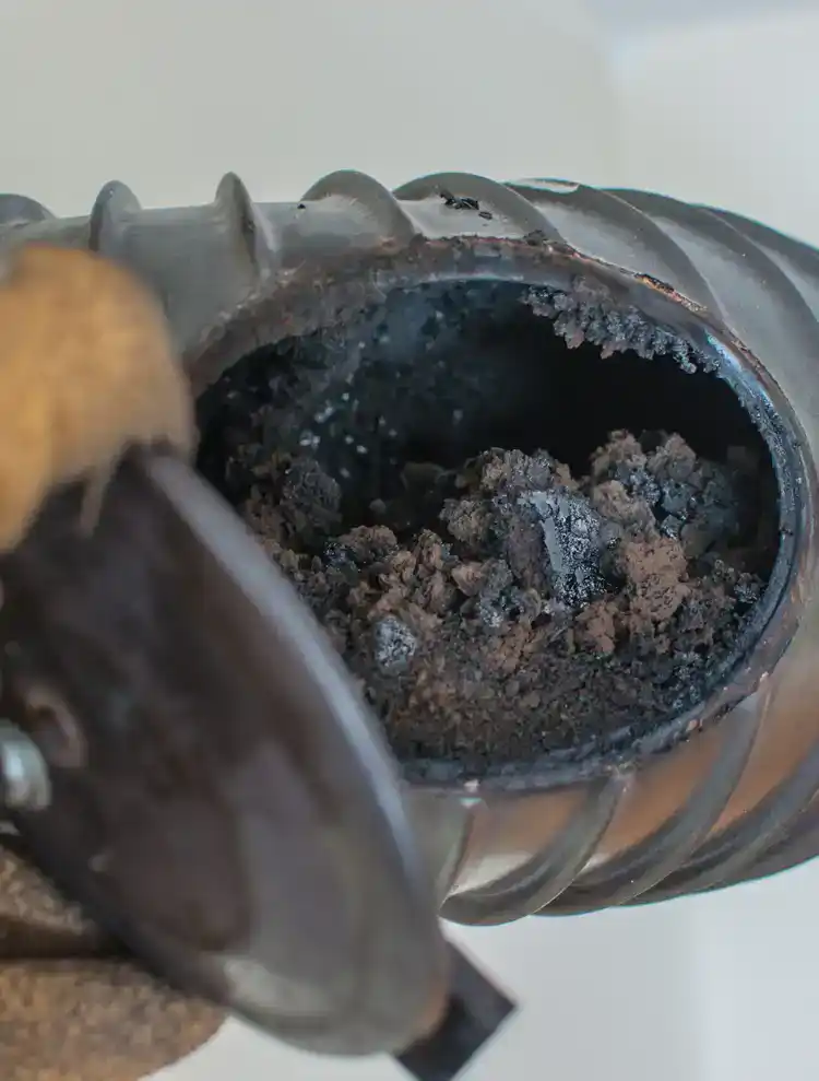 Flue inspection door reveals a build up of flammable material